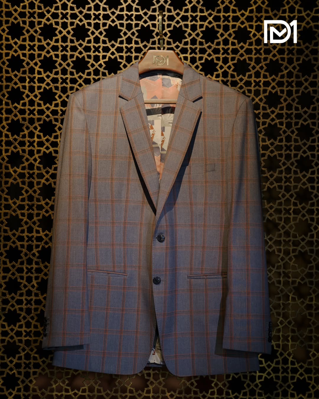 Grey checked bespoke blazer on a dark background